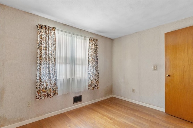 352 Cove Ave, Warwick, RI 02886 - spare room featuring wood finished floors and baseboards