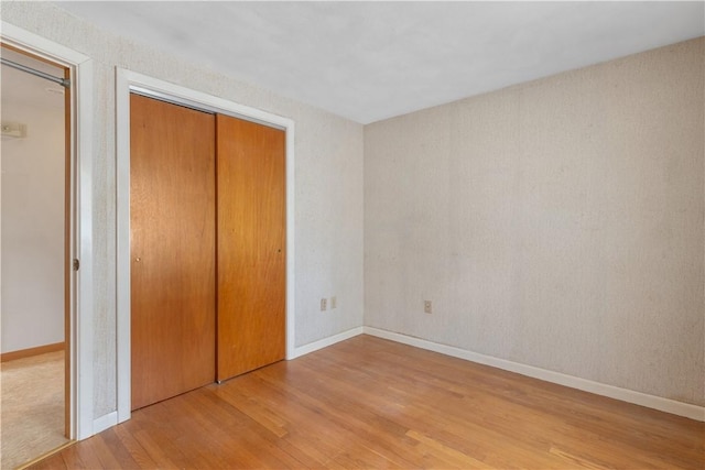 352 Cove Ave, Warwick, RI 02886 - unfurnished bedroom with light wood-type flooring and a closet