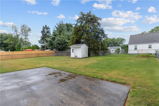 352 Cove Ave, Warwick, RI 02886 - fenced backyard featuring a patio and a storage shed