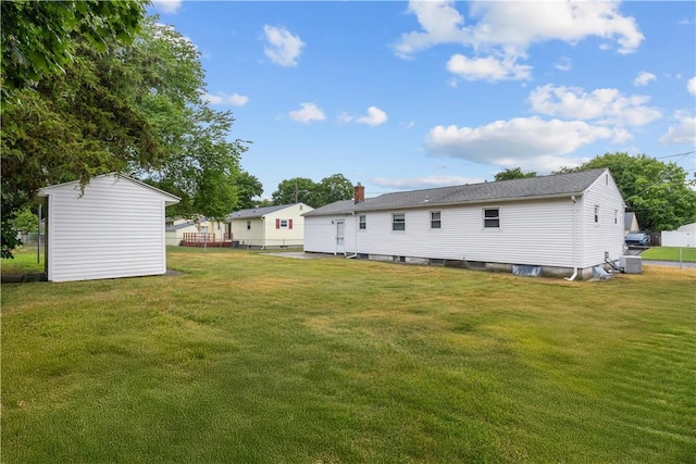 352 Cove Ave, Warwick, RI 02886 - rear view of house featuring an outdoor structure