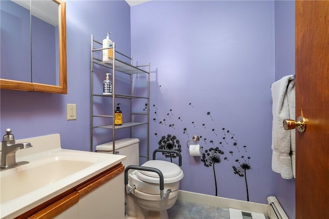 2 Angle St Unit 5, Lincoln, RI 02838 - bathroom featuring a baseboard radiator and vanity