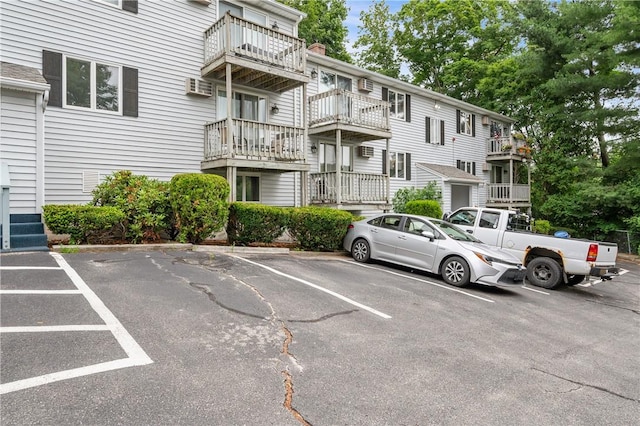 2 Angle St Unit 5, Lincoln, RI 02838 - uncovered parking lot with a wall mounted air conditioner