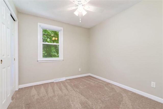5 Spirketing St, Jamestown, RI 02835 - unfurnished bedroom with carpet, a closet, and a ceiling fan
