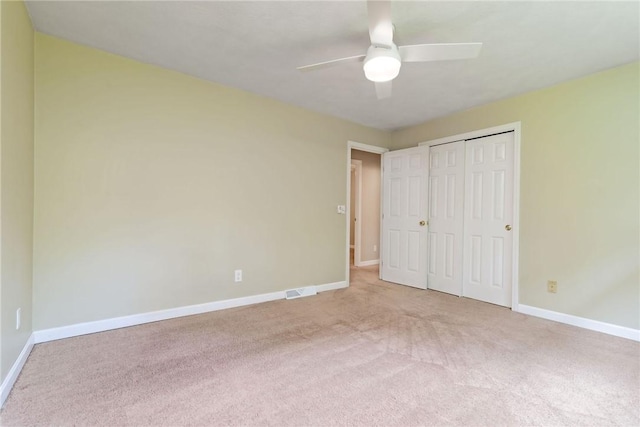 5 Spirketing St, Jamestown, RI 02835 - unfurnished bedroom featuring carpet floors, a closet, and ceiling fan
