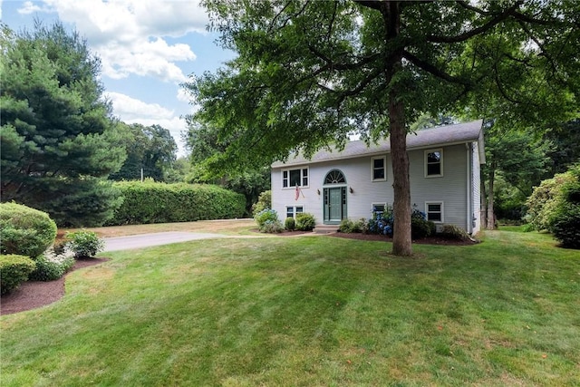 5 Spirketing St, Jamestown, RI 02835 - view of front facade featuring a front lawn