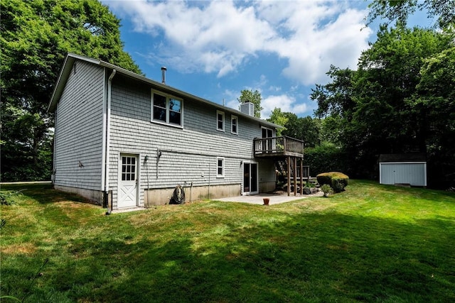 5 Spirketing St, Jamestown, RI 02835 - back of property with a patio area, a chimney, a yard, and a deck