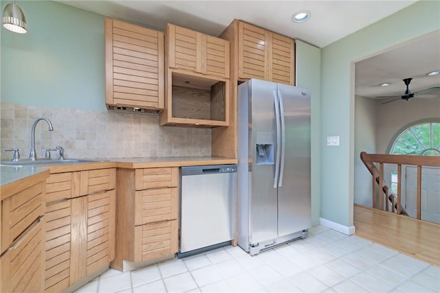 5 Spirketing St, Jamestown, RI 02835 - kitchen featuring appliances with stainless steel finishes, backsplash, recessed lighting, a ceiling fan, and light countertops