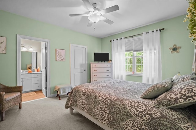 170 Providence Pike Unit 145, North Smithfield, RI 02896 - bedroom featuring light carpet, connected bathroom, and ceiling fan