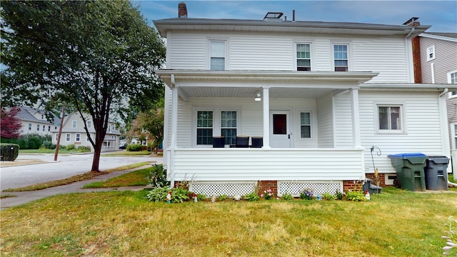 95 Burlington St, Providence, RI 02906 - view of front of home with a porch and a front lawn
