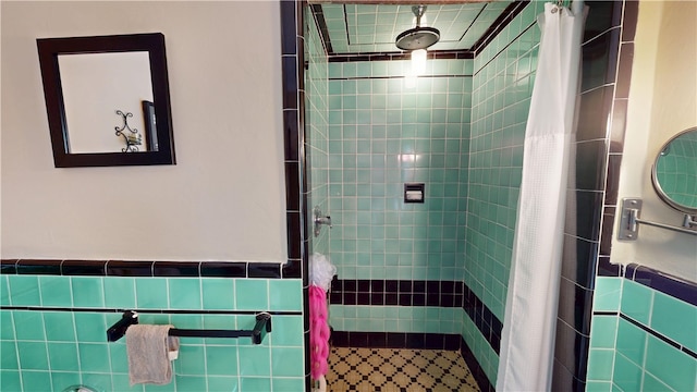 95 Burlington St, Providence, RI 02906 - full bath featuring a tile shower and wainscoting