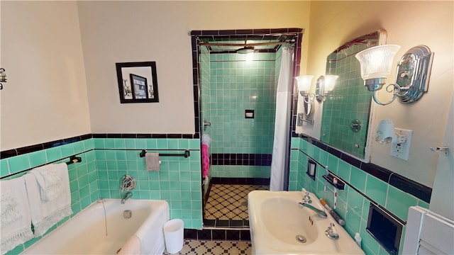 95 Burlington St, Providence, RI 02906 - bathroom featuring tile walls, a stall shower, a garden tub, and a wainscoted wall