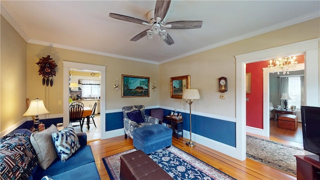 95 Burlington St, Providence, RI 02906 - living area featuring wood finished floors, a ceiling fan, ornamental molding, and a chandelier