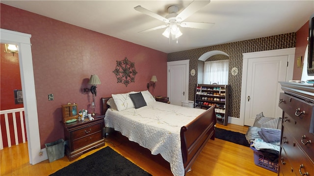 95 Burlington St, Providence, RI 02906 - bedroom featuring wallpapered walls, light wood-type flooring, and ceiling fan