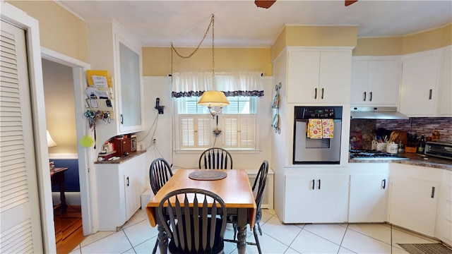 95 Burlington St, Providence, RI 02906 - dining room with light tile patterned floors
