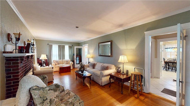 95 Burlington St, Providence, RI 02906 - living room with ornamental molding, wood finished floors, and a fireplace