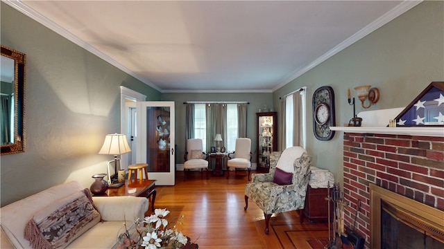 95 Burlington St, Providence, RI 02906 - living room with wood finished floors, a fireplace, and ornamental molding