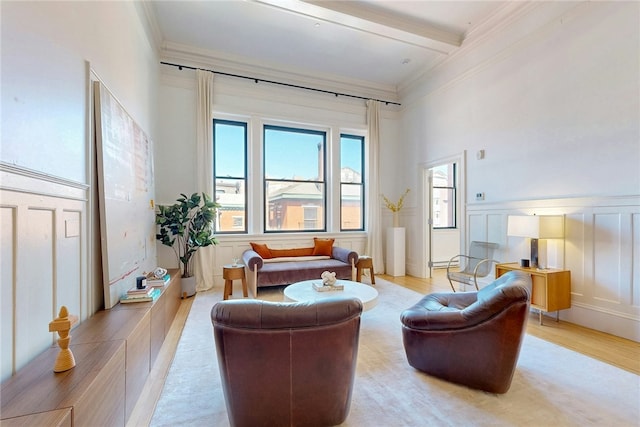 225 Weybosset St Unit 12, Providence, RI 02903 - living area featuring crown molding, healthy amount of natural light, beam ceiling, and light wood-style floors