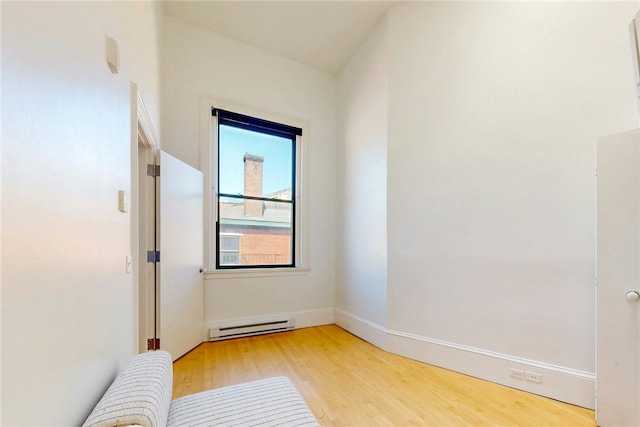 225 Weybosset St Unit 12, Providence, RI 02903 - empty room featuring baseboard heating and light wood finished floors