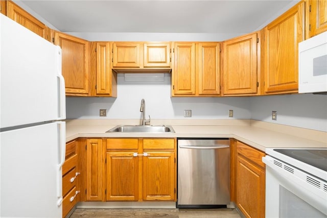 1800 Douglas Ave Unit 304, North Providence, RI 02904 - kitchen featuring white appliances, light countertops, and light wood-style floors