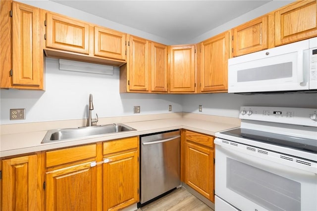 1800 Douglas Ave Unit 304, North Providence, RI 02904 - kitchen with white appliances, light countertops, and light wood-type flooring