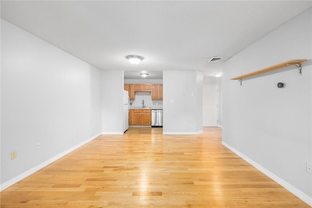 1800 Douglas Ave Unit 304, North Providence, RI 02904 - unfurnished living room with light wood-type flooring and baseboards