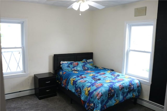 35 Merida Ave, Woonsocket, RI 02895 - carpeted bedroom with a baseboard radiator and ceiling fan