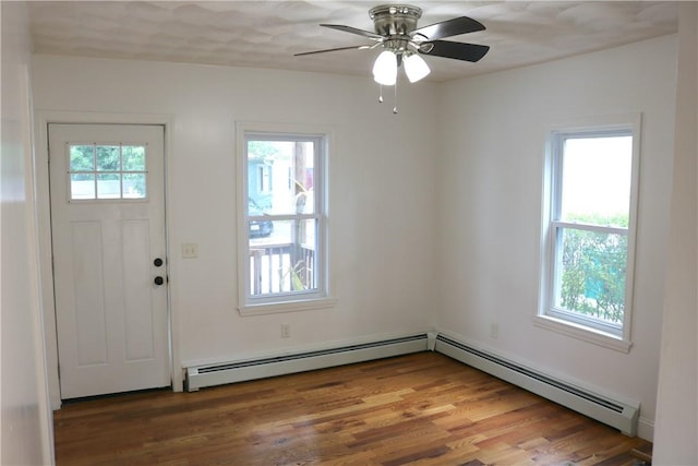 35 Merida Ave, Woonsocket, RI 02895 - entryway with a baseboard heating unit, wood finished floors, and ceiling fan