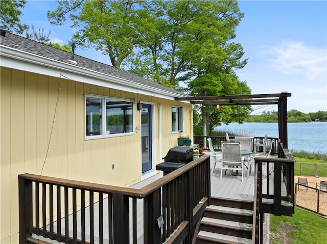 106 Lauri Dr, Charlestown, RI 02813 - wooden terrace featuring a water view and outdoor dining area