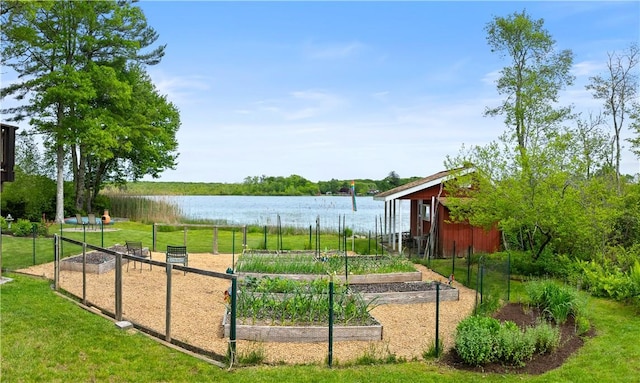 106 Lauri Dr, Charlestown, RI 02813 - surrounding community featuring a garden, a water view, and a yard