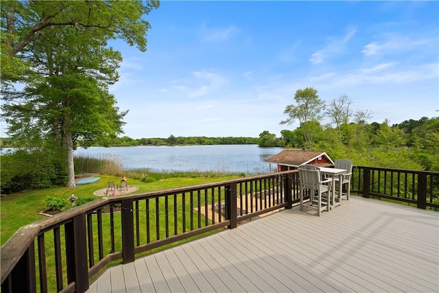 106 Lauri Dr, Charlestown, RI 02813 - wooden terrace with a water view and a lawn