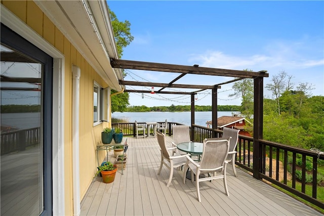 106 Lauri Dr, Charlestown, RI 02813 - deck with outdoor dining space and a water view