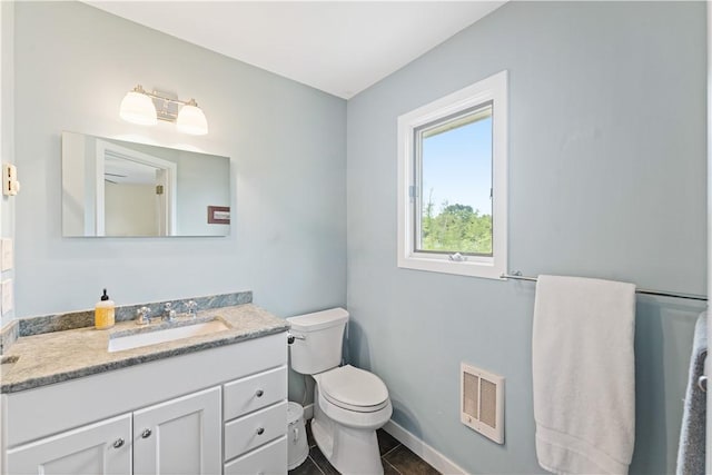 106 Lauri Dr, Charlestown, RI 02813 - bathroom featuring vanity, heating unit, and tile patterned flooring