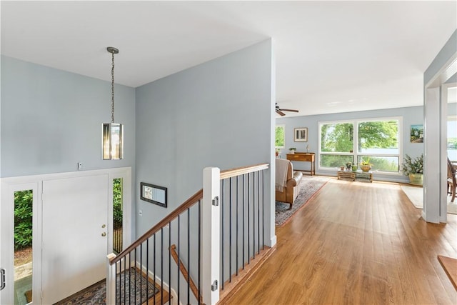 106 Lauri Dr, Charlestown, RI 02813 - foyer featuring light wood-type flooring, ceiling fan, and a towering ceiling