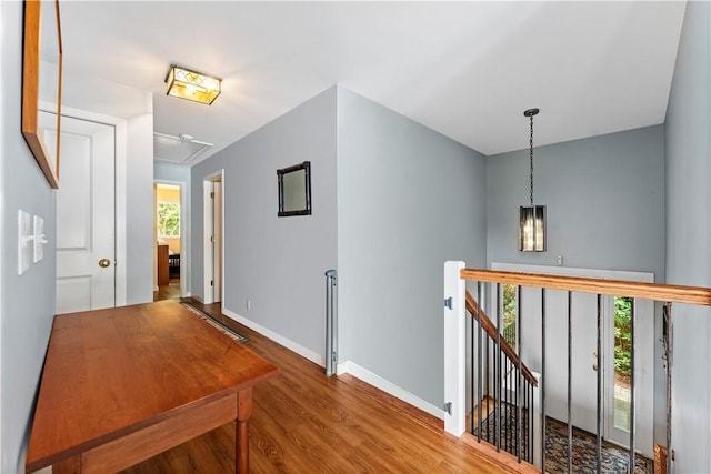 106 Lauri Dr, Charlestown, RI 02813 - hall with an upstairs landing, attic access, and wood finished floors