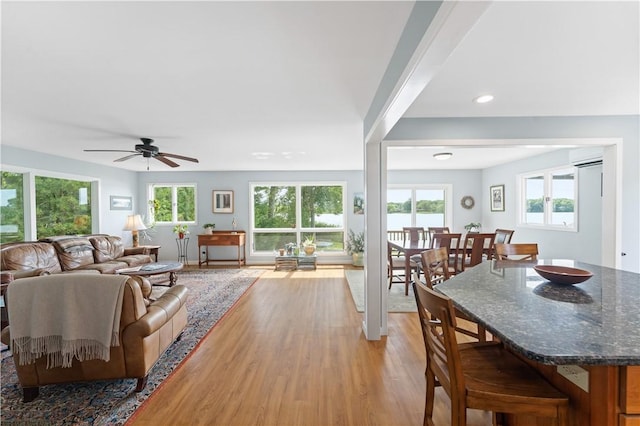 106 Lauri Dr, Charlestown, RI 02813 - living room with light wood finished floors, a ceiling fan, and recessed lighting
