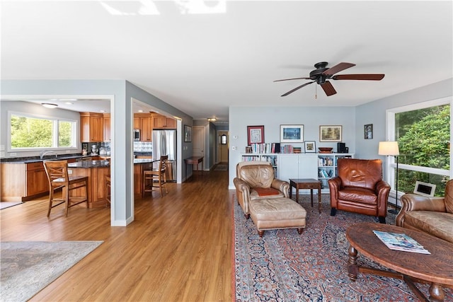 106 Lauri Dr, Charlestown, RI 02813 - living room with light wood-type flooring and ceiling fan