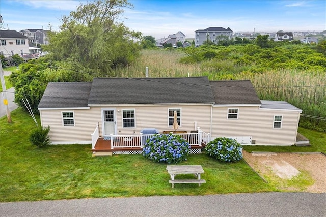 2 Geraldine Blvd, Narragansett, RI 02882 - rear view of house featuring a wooden deck, a yard, and roof with shingles