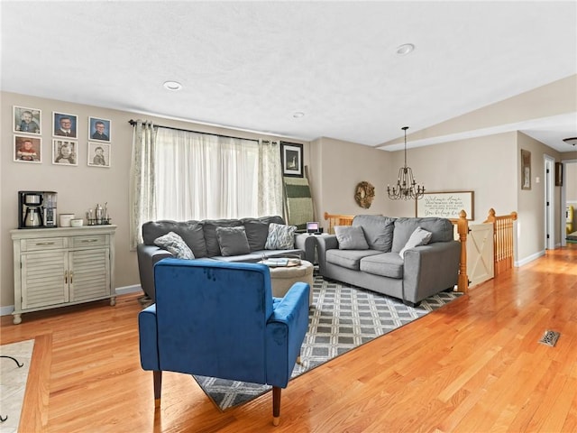 15 Sycamore Dr, West Warwick, RI 02893 - living area with wood finished floors, a chandelier, and recessed lighting