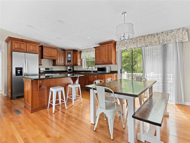 15 Sycamore Dr, West Warwick, RI 02893 - dining space featuring light wood-style flooring, a chandelier, and recessed lighting