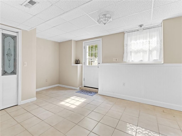 15 Sycamore Dr, West Warwick, RI 02893 - tiled entrance foyer featuring wainscoting and a drop ceiling