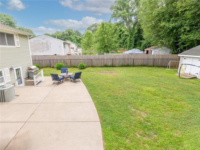15 Sycamore Dr, West Warwick, RI 02893 - fenced backyard featuring a patio