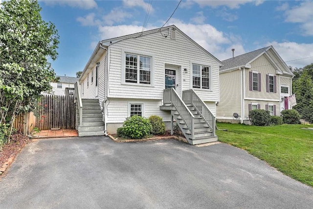 28 Plant St, Cumberland, RI 02864 - view of front of property with stairway and a patio area