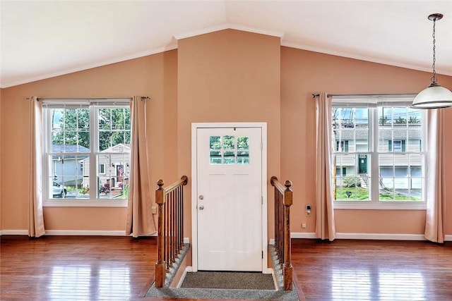 28 Plant St, Cumberland, RI 02864 - entrance foyer featuring lofted ceiling, dark wood finished floors, and ornamental molding