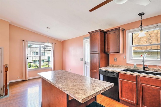 28 Plant St, Cumberland, RI 02864 - kitchen with dishwasher, a ceiling fan, light wood-type flooring, lofted ceiling, and a kitchen island
