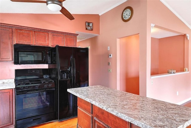 28 Plant St, Cumberland, RI 02864 - kitchen featuring black appliances, lofted ceiling, a ceiling fan, light countertops, and ornamental molding
