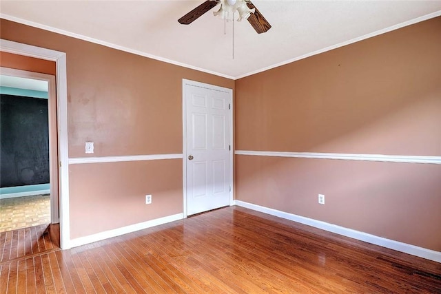 28 Plant St, Cumberland, RI 02864 - spare room featuring ceiling fan, wood finished floors, and crown molding