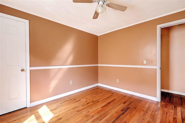 28 Plant St, Cumberland, RI 02864 - empty room with a ceiling fan, wood finished floors, and crown molding