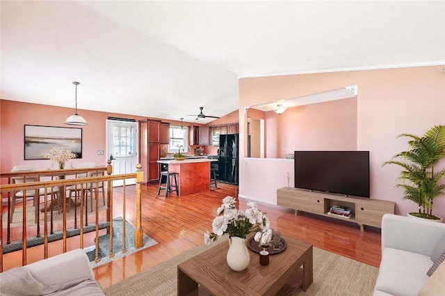 28 Plant St, Cumberland, RI 02864 - living room featuring ceiling fan, light wood finished floors, and vaulted ceiling