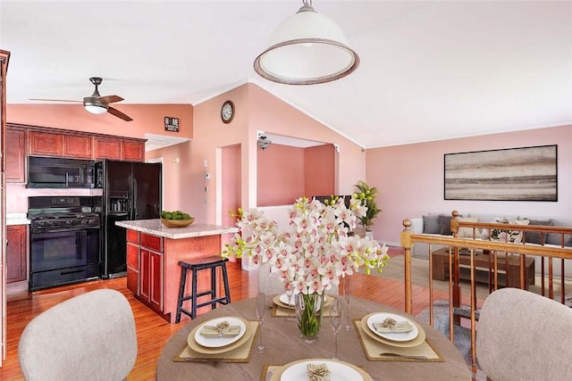 28 Plant St, Cumberland, RI 02864 - dining room with lofted ceiling, light wood finished floors, and ceiling fan
