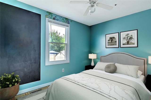 28 Plant St, Cumberland, RI 02864 - bedroom with wood finished floors and a ceiling fan